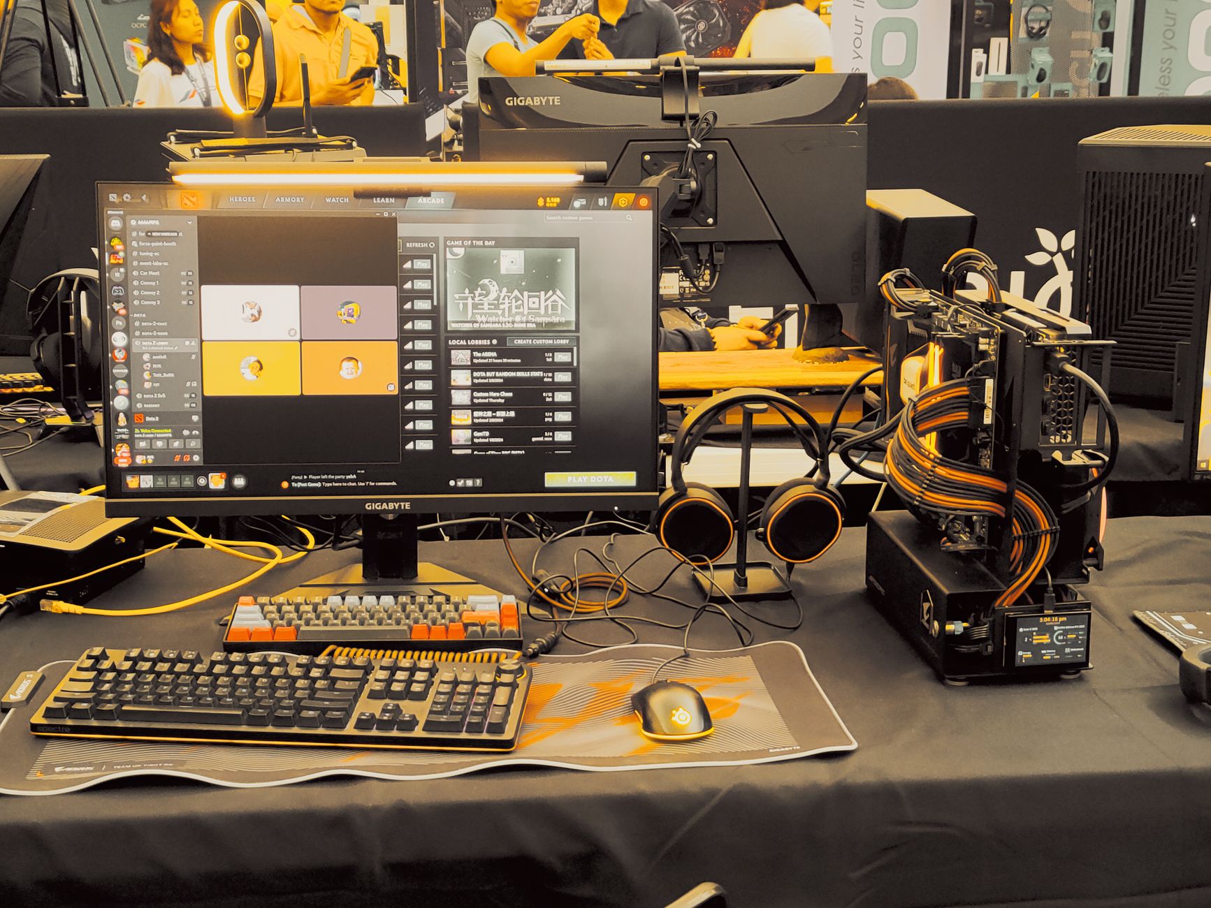 Modern gaming gear setup on display at a tech expo.