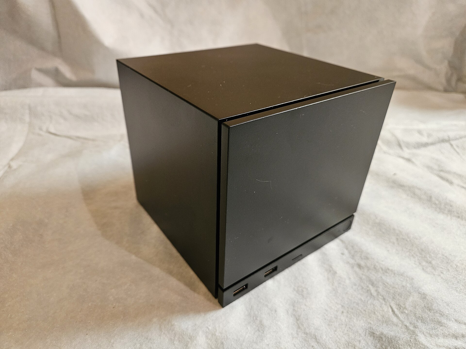 Photograph of the front side of Valve's Steam Machine (released in 2026)