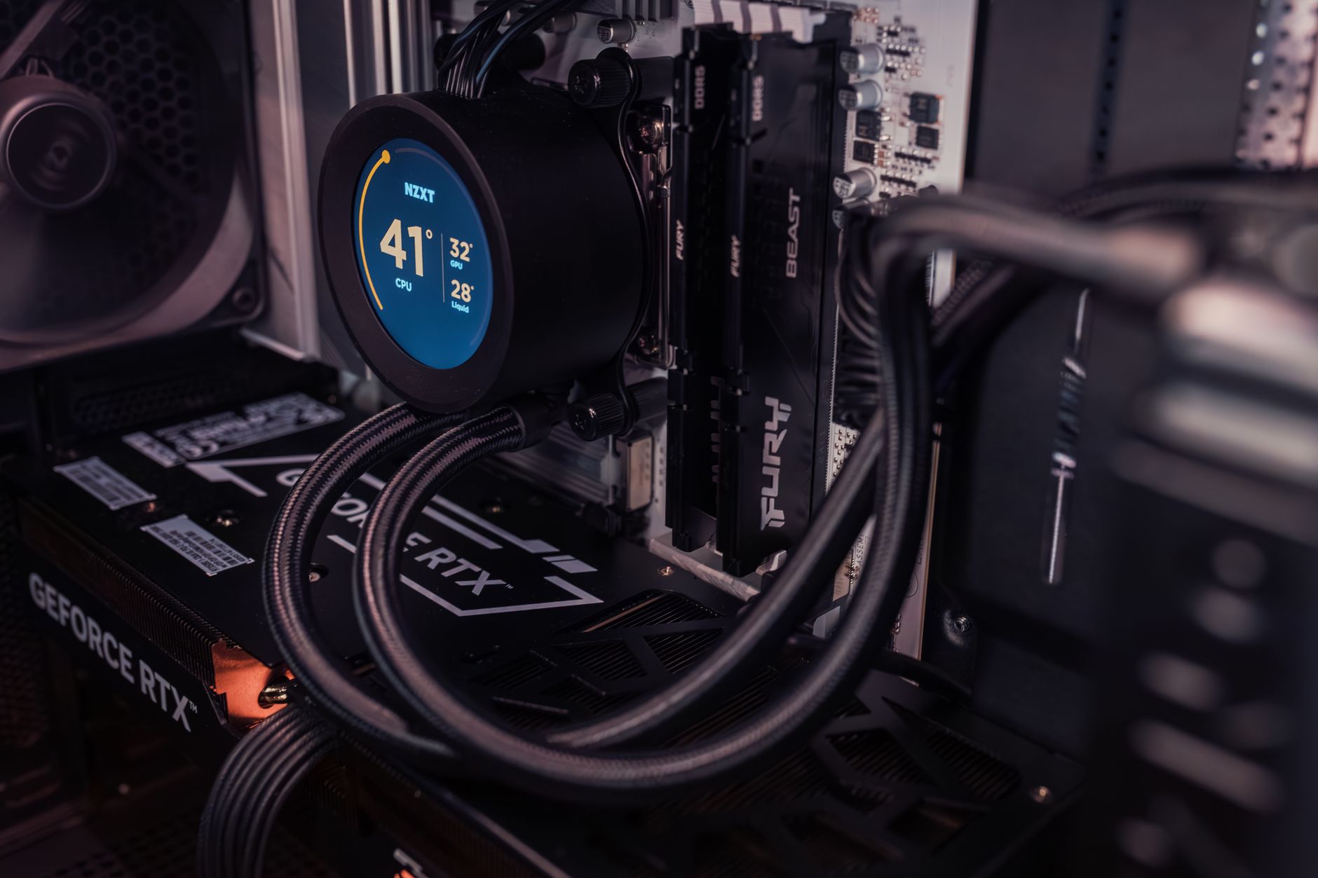 Internal view of a gaming PC showcasing advanced cooling and graphics capability.